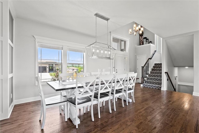 2312 SW Morris Dr, Lees Summit, MO 64082 - dining space featuring a chandelier, wood finished floors, and stairway