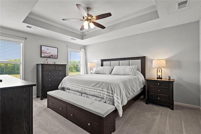 2312 SW Morris Dr, Lees Summit, MO 64082 - bedroom featuring a raised ceiling, light carpet, crown molding, and ceiling fan