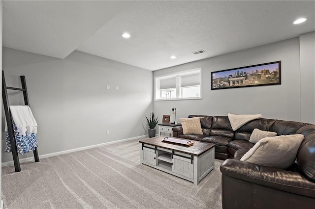 2312 SW Morris Dr, Lees Summit, MO 64082 - living area featuring light carpet, recessed lighting, and a textured ceiling