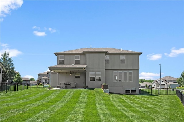 2312 SW Morris Dr, Lees Summit, MO 64082 - back of house featuring ceiling fan, a fenced backyard, and a patio