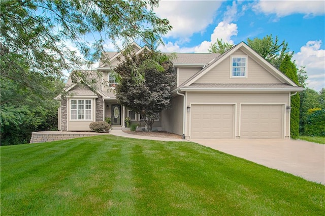 908 Pca Rd, Warrensburg, MO 64093 - view of front of house featuring driveway, a front lawn, and an attached garage