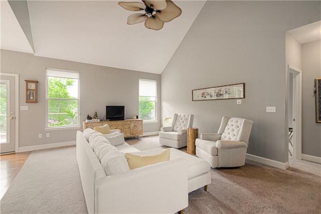 908 Pca Rd, Warrensburg, MO 64093 - living area with ceiling fan, light colored carpet, and high vaulted ceiling