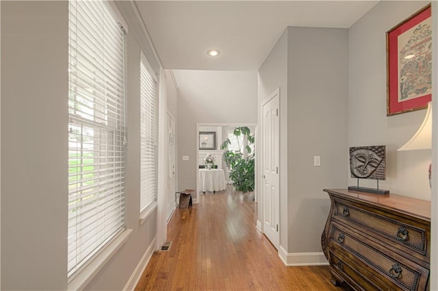 908 Pca Rd, Warrensburg, MO 64093 - hall with light wood-style floors and recessed lighting