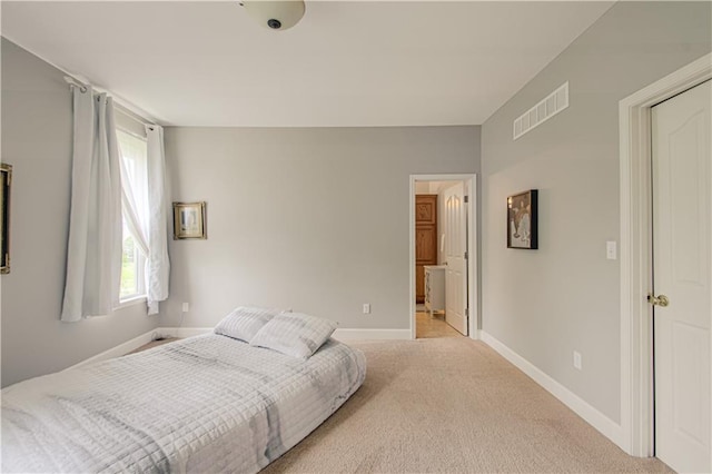 908 Pca Rd, Warrensburg, MO 64093 - carpeted bedroom with baseboards