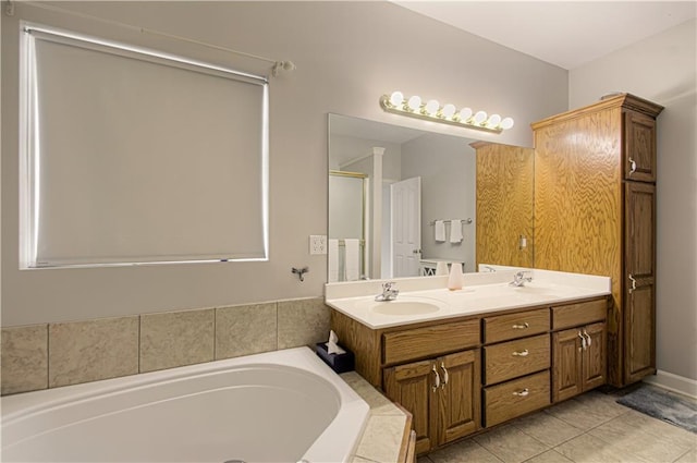 908 Pca Rd, Warrensburg, MO 64093 - full bath with a bath, double vanity, and tile patterned flooring