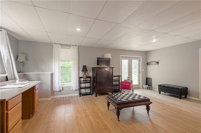 908 Pca Rd, Warrensburg, MO 64093 - living room with light wood-style flooring, a paneled ceiling, plenty of natural light, and recessed lighting