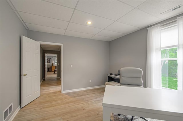 908 Pca Rd, Warrensburg, MO 64093 - home office featuring light wood-style flooring, a paneled ceiling, and recessed lighting