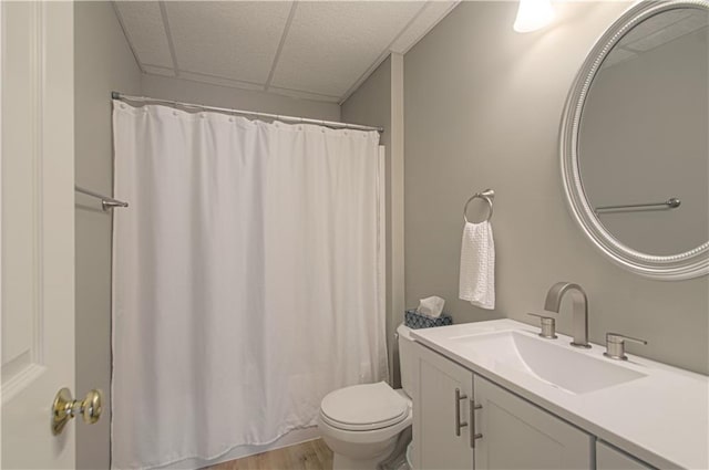 908 Pca Rd, Warrensburg, MO 64093 - full bathroom with vanity, curtained shower, and wood finished floors