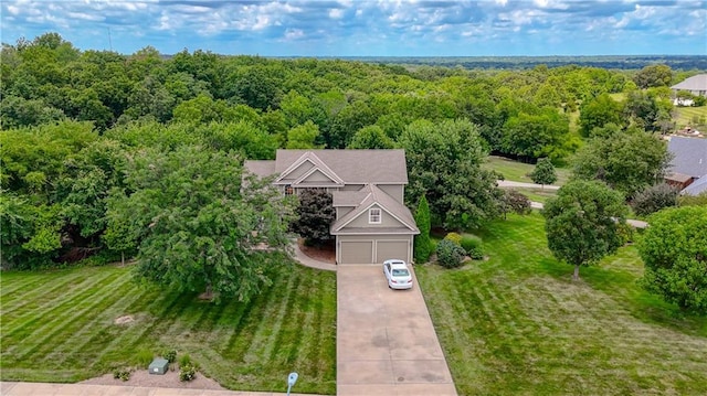 908 Pca Rd, Warrensburg, MO 64093 - view of subject property featuring a heavily wooded area