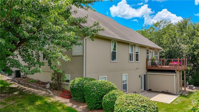 908 Pca Rd, Warrensburg, MO 64093 - view of home's exterior featuring a patio area and a central air condition unit
