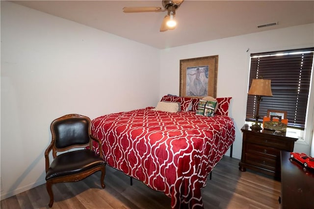 329 W 26th Ln, Eudora, KS 66025 - bedroom featuring wood finished floors and ceiling fan