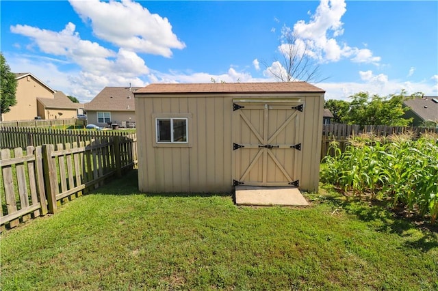 329 W 26th Ln, Eudora, KS 66025 - view of shed featuring a fenced backyard