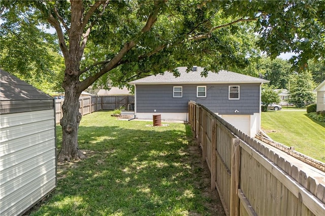 1304 S 39th St, Saint Joseph, MO 64507 - back of house with a garage and a fenced backyard