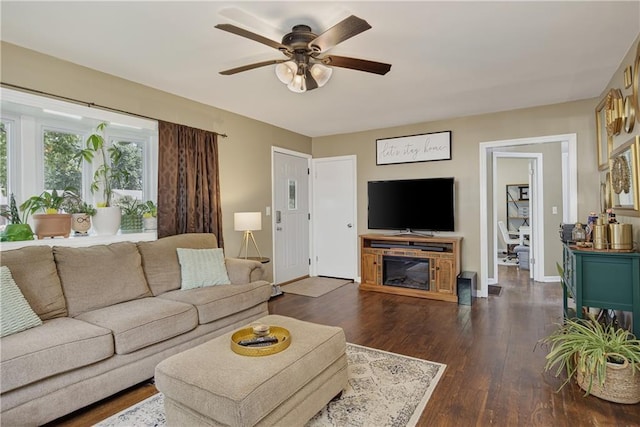 1304 S 39th St, Saint Joseph, MO 64507 - living room with a ceiling fan and dark wood-type flooring