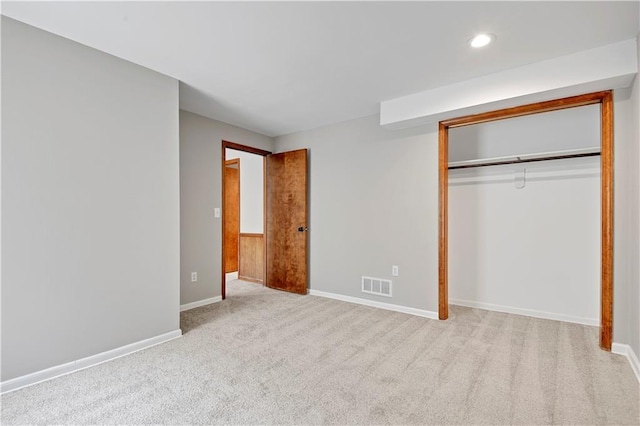 12303 W 105th Ter, Overland Park, KS 66215 - unfurnished bedroom with carpet flooring, a closet, and recessed lighting