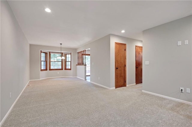 12303 W 105th Ter, Overland Park, KS 66215 - spare room featuring light colored carpet and recessed lighting