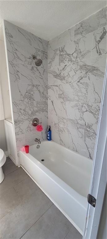 5107 E 26th St, Kansas City, MO 64127 - full bath featuring shower / bathtub combination and a textured ceiling