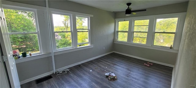 5107 E 26th St, Kansas City, MO 64127 - unfurnished sunroom featuring plenty of natural light