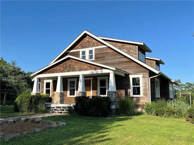 11320 Reno Rd, Oskaloosa, KS 66066 - view of front facade featuring a front lawn and covered porch