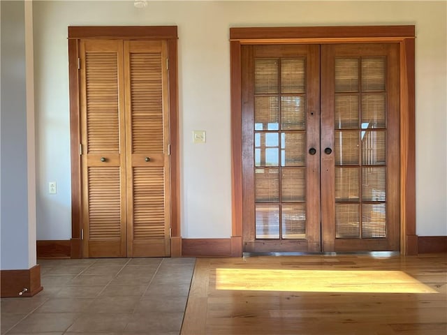 11320 Reno Rd, Oskaloosa, KS 66066 - hall with french doors and baseboards