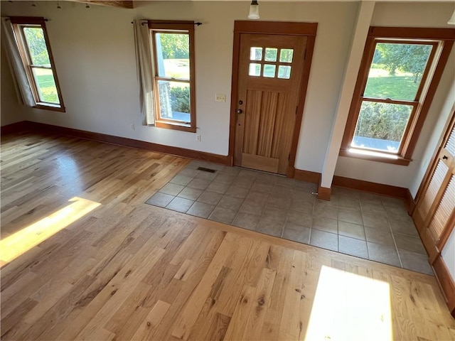 11320 Reno Rd, Oskaloosa, KS 66066 - foyer entrance featuring light wood-style flooring and baseboards