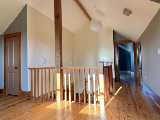 11320 Reno Rd, Oskaloosa, KS 66066 - corridor featuring hardwood / wood-style flooring and an upstairs landing