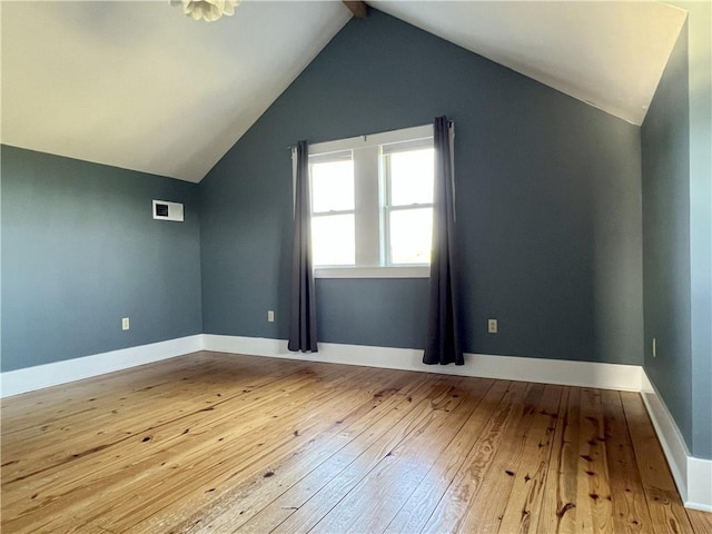 11320 Reno Rd, Oskaloosa, KS 66066 - additional living space with hardwood / wood-style flooring and lofted ceiling