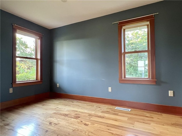 11320 Reno Rd, Oskaloosa, KS 66066 - spare room with wood finished floors and baseboards