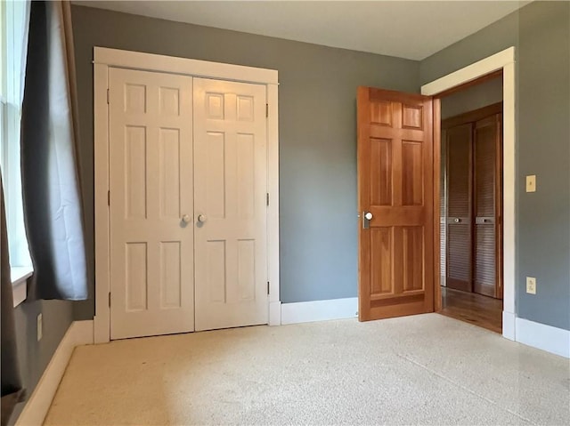 11320 Reno Rd, Oskaloosa, KS 66066 - unfurnished bedroom with a closet and carpet flooring