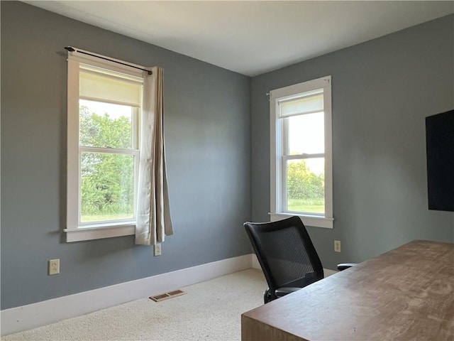 11320 Reno Rd, Oskaloosa, KS 66066 - home office with healthy amount of natural light and carpet flooring