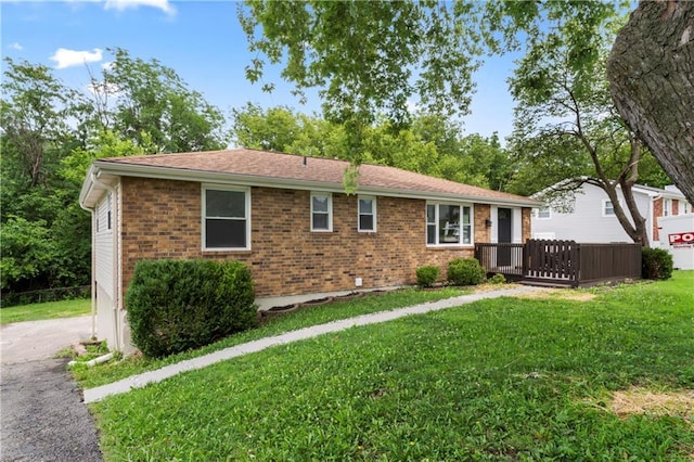 26 Misty Springs Cir, Platte City, MO 64079 - rear view of property with brick siding and a yard