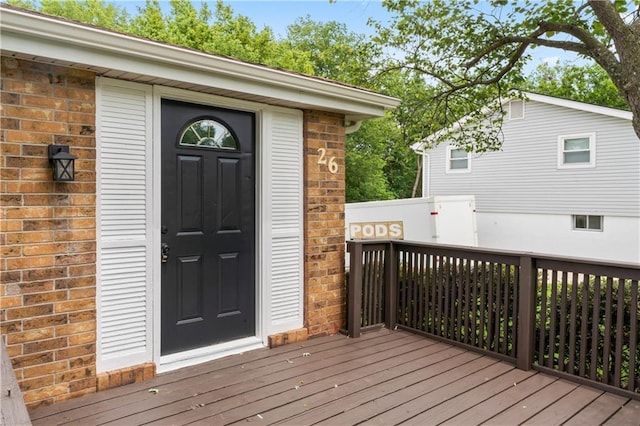 26 Misty Springs Cir, Platte City, MO 64079 - doorway to property with a deck and brick siding