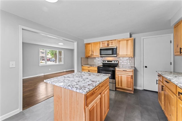 26 Misty Springs Cir, Platte City, MO 64079 - kitchen with stainless steel appliances, backsplash, light stone countertops, a center island, and open floor plan