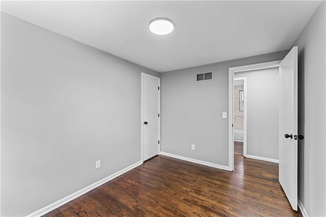 26 Misty Springs Cir, Platte City, MO 64079 - unfurnished bedroom featuring wood finished floors and baseboards