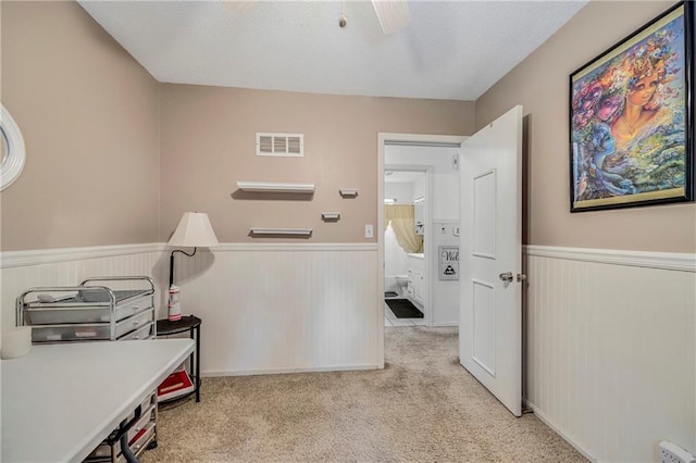 300 NE R D Mize Rd, Blue Springs, MO 64014 - office area featuring wainscoting, carpet flooring, a ceiling fan, and wooden walls