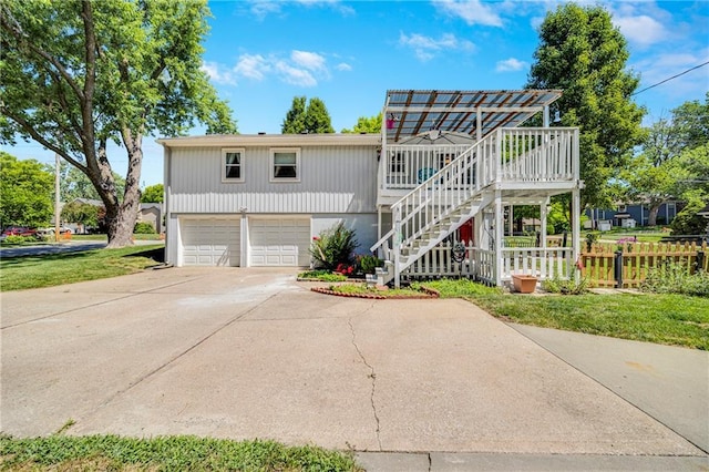 300 NE R D Mize Rd, Blue Springs, MO 64014 - view of front of house with an attached garage, driveway, and stairs