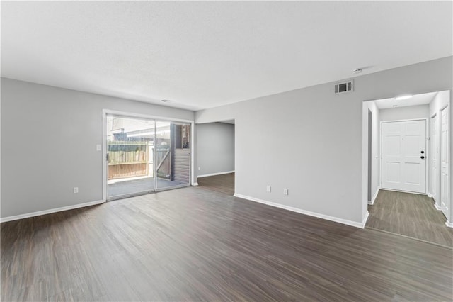 10240 W 96th Ter Unit B, Overland Park, KS 66212 - unfurnished room with baseboards and dark wood finished floors