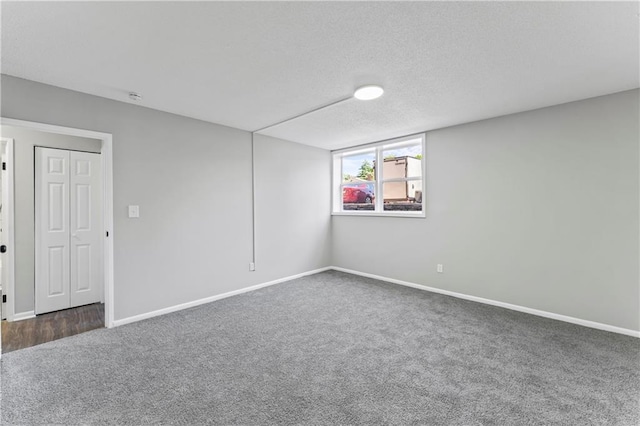 10240 W 96th Ter Unit B, Overland Park, KS 66212 - empty room featuring carpet flooring and a textured ceiling