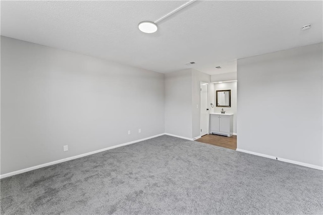 10240 W 96th Ter Unit B, Overland Park, KS 66212 - unfurnished room with carpet floors and a textured ceiling