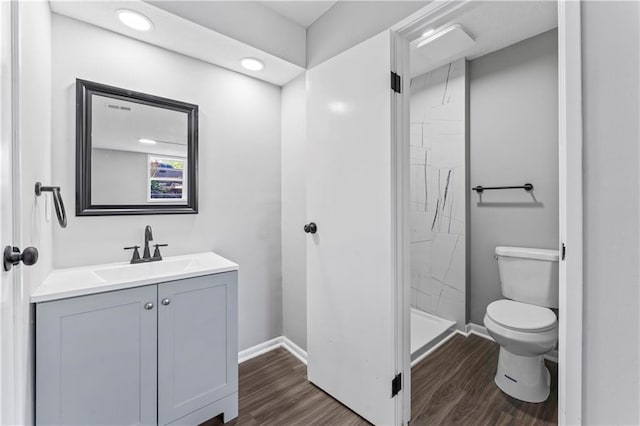 10240 W 96th Ter Unit B, Overland Park, KS 66212 - full bath with vanity, wood finished floors, a stall shower, and recessed lighting