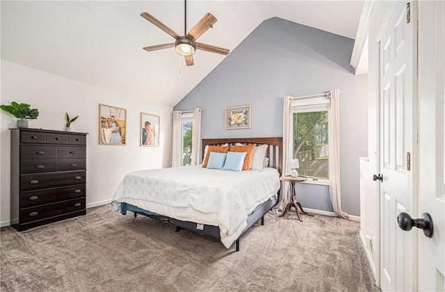 10512 Shelton Ave, Edwardsville, KS 66111 - carpeted bedroom featuring multiple windows, ceiling fan, and high vaulted ceiling