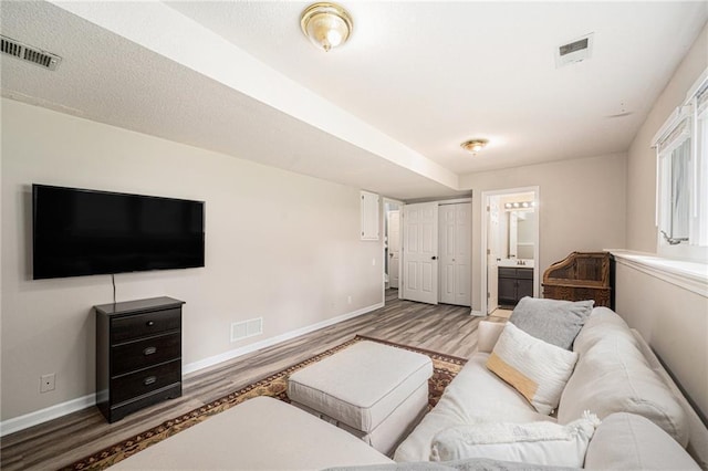 10512 Shelton Ave, Edwardsville, KS 66111 - living area with wood finished floors and baseboards