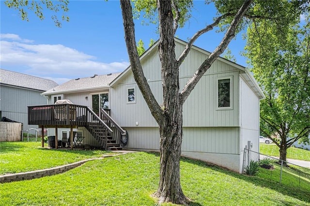10512 Shelton Ave, Edwardsville, KS 66111 - rear view of house featuring stairs and a deck