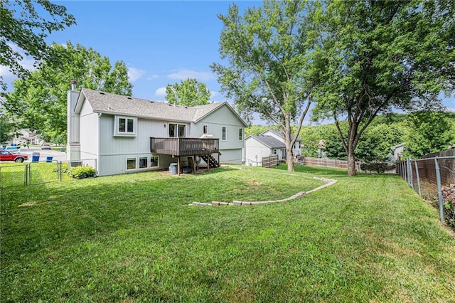 10512 Shelton Ave, Edwardsville, KS 66111 - rear view of property with stairs, a deck, a fenced backyard, and a chimney