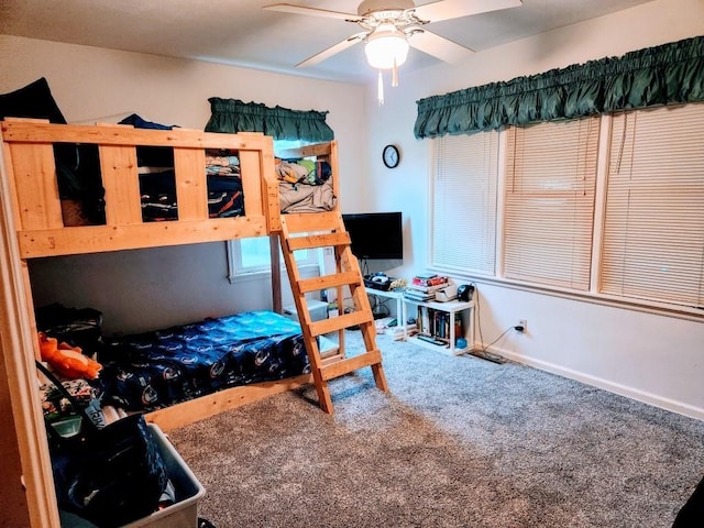 520 S Russell St, Odessa, MO 64076 - bedroom with carpet floors and ceiling fan