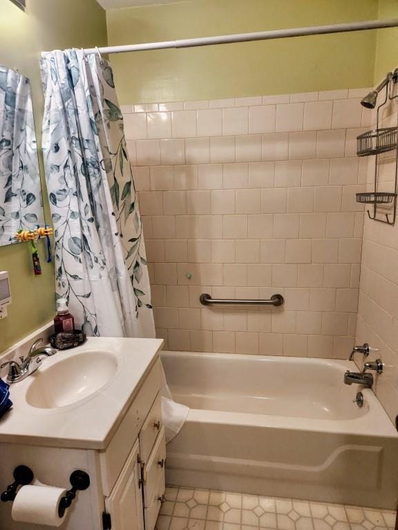 520 S Russell St, Odessa, MO 64076 - bathroom featuring vanity, shower / bath combination with curtain, and tile patterned flooring