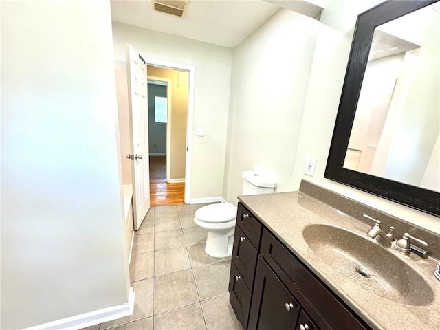1012 NW A St, Blue Springs, MO 64015 - full bathroom featuring vanity, tile patterned flooring, and a bathtub