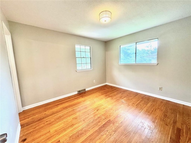 1012 NW A St, Blue Springs, MO 64015 - unfurnished room with wood finished floors and baseboards