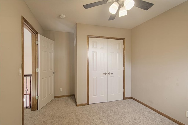 8300 W 148th St, Overland Park, KS 66223 - unfurnished bedroom with a closet, light colored carpet, and a ceiling fan