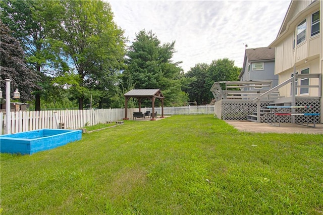 8300 W 148th St, Overland Park, KS 66223 - fenced backyard featuring a gazebo and a patio